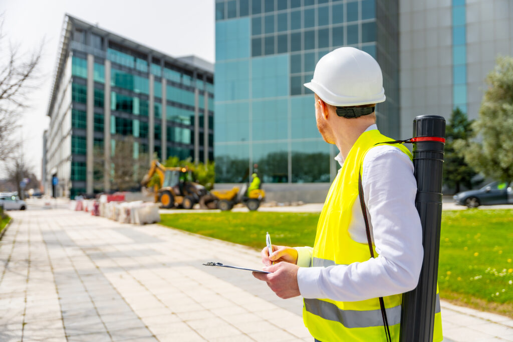 Engineer inspecting an existing commercial building