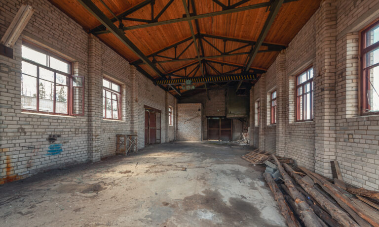 Interior of an existing brick building prepared for refurbishment
